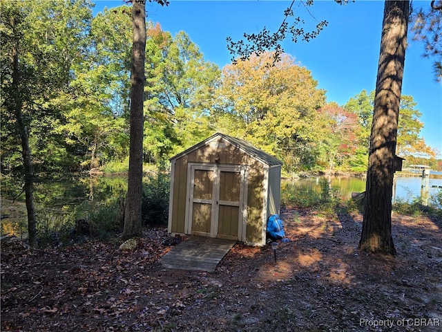 view of outdoor structure with a water view