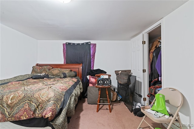 bedroom with carpet floors and a closet