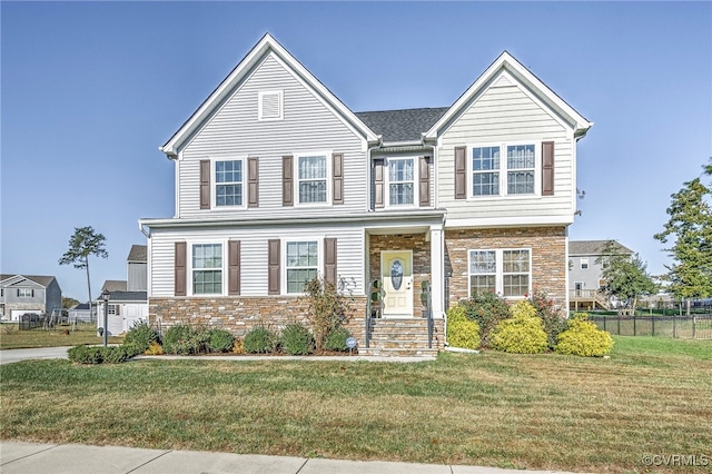 view of front of property featuring a front lawn