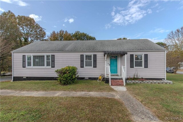 view of front of house featuring a front yard