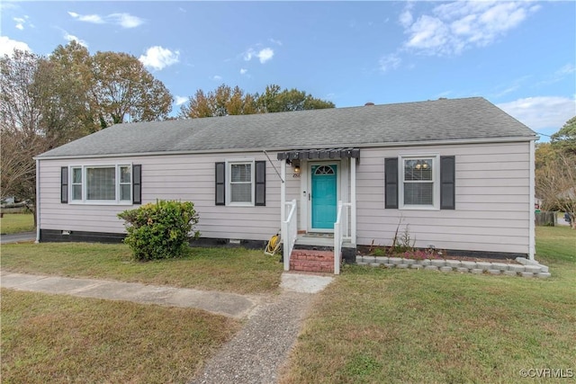 view of front of property featuring a front yard