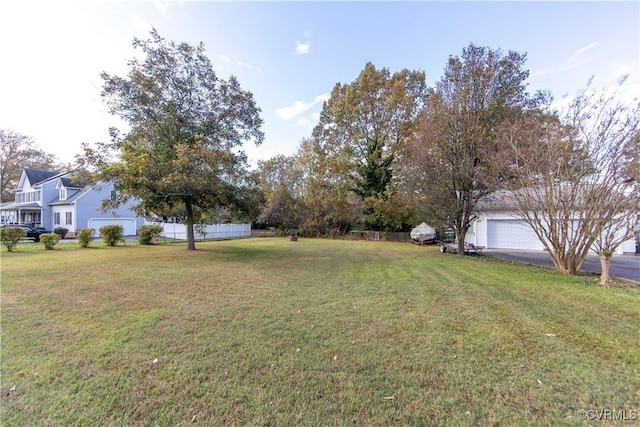 view of yard with a garage