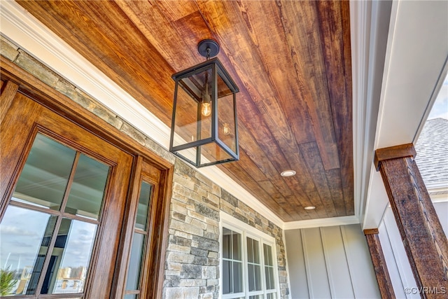 exterior details with crown molding and wooden ceiling