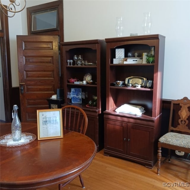 home office with light wood-style floors