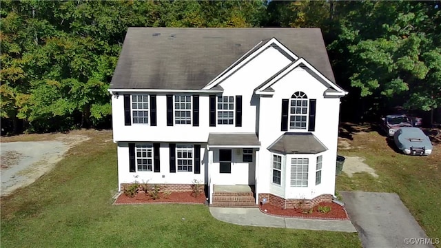 view of front of house with a front lawn