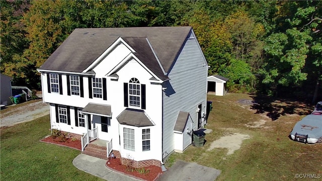 view of front of home with a front lawn