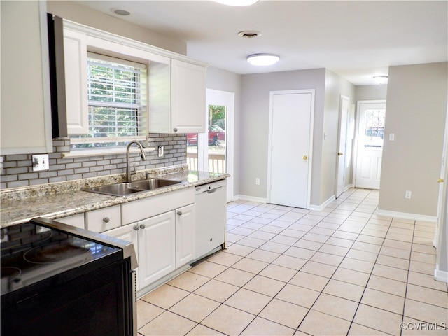 kitchen featuring range, white cabinets, sink, and white dishwasher