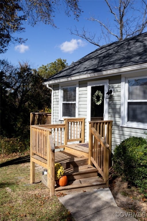 doorway to property with a deck