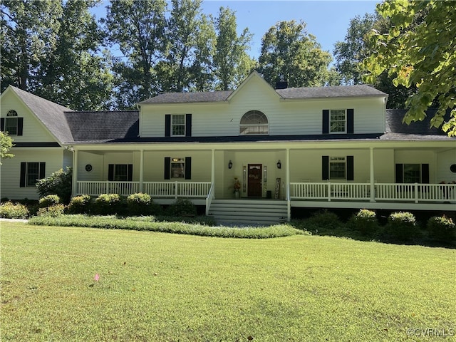 farmhouse inspired home featuring a porch and a front lawn