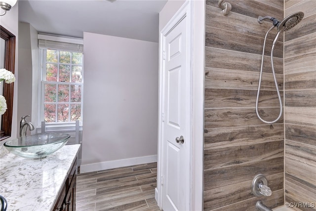 bathroom featuring vanity and wood-type flooring