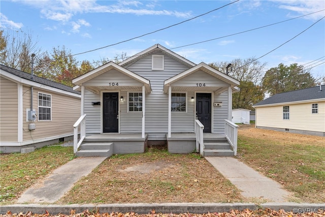 bungalow-style house featuring covered porch