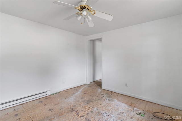 unfurnished room featuring ceiling fan and a baseboard radiator