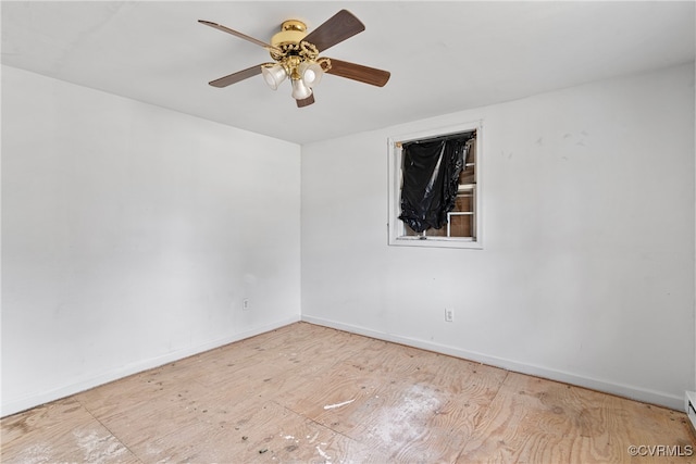 unfurnished room featuring ceiling fan and light hardwood / wood-style flooring