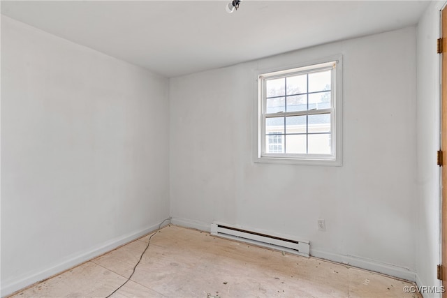 spare room featuring baseboard heating