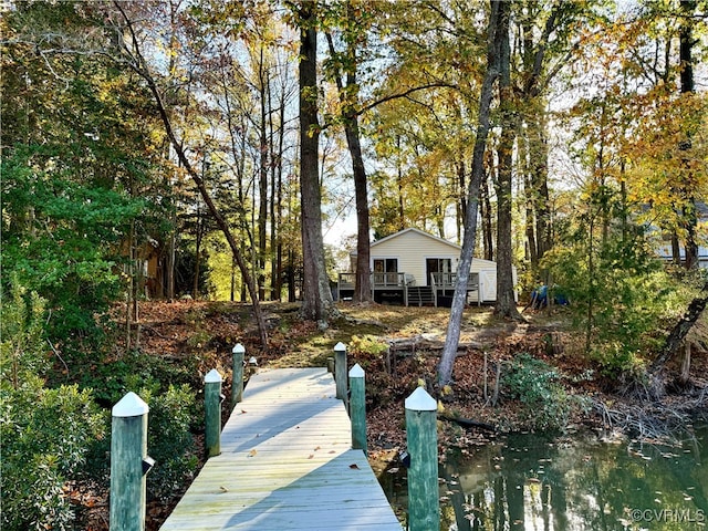 dock area featuring a water view