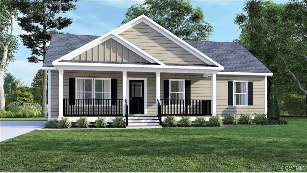 view of front of home featuring a front yard and covered porch