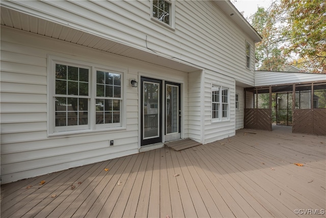 deck featuring a sunroom