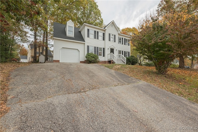 view of front of property featuring a garage