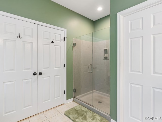 bathroom featuring tile patterned floors and walk in shower