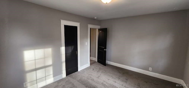 unfurnished bedroom featuring light colored carpet