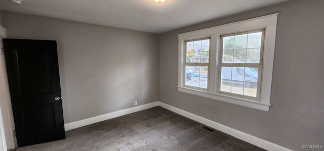 view of carpeted spare room