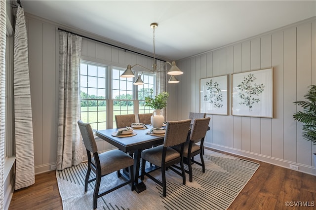 dining space featuring hardwood / wood-style floors