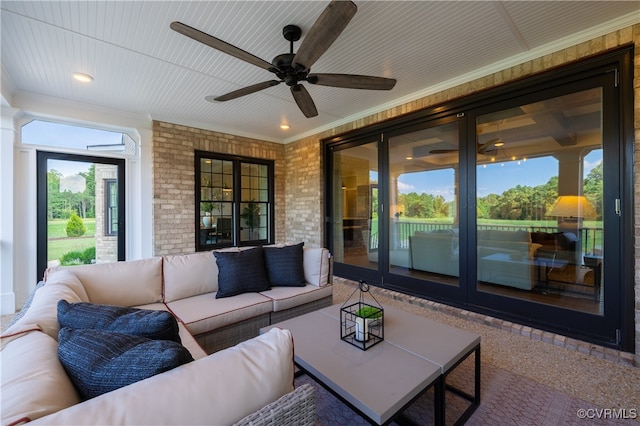 view of patio / terrace featuring ceiling fan and an outdoor living space