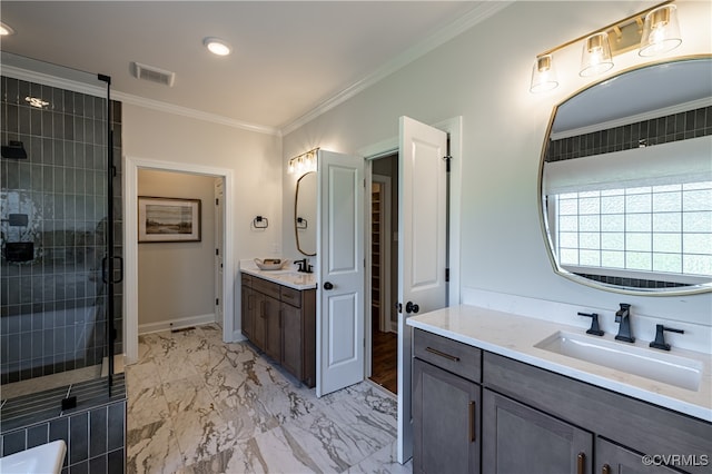 bathroom with an enclosed shower, vanity, and crown molding