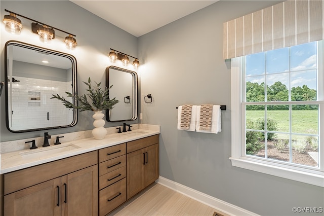 bathroom with vanity and an enclosed shower