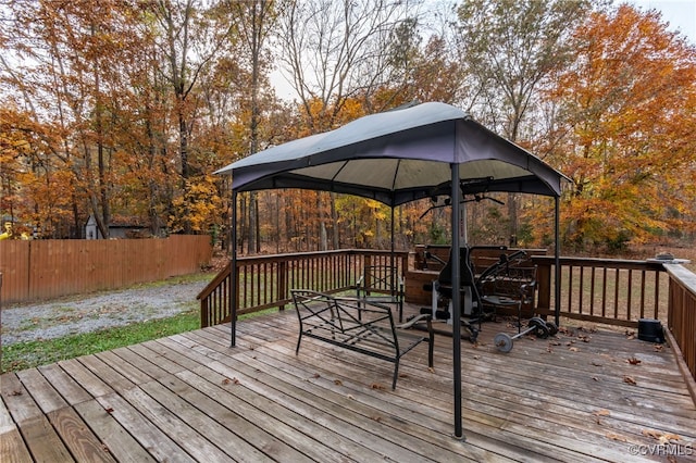 wooden terrace with a gazebo