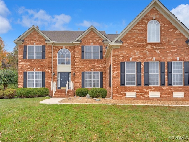 view of front facade with a front lawn