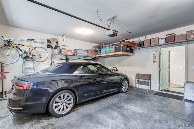 garage featuring a garage door opener