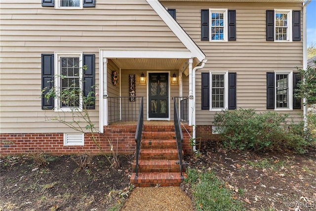 doorway to property featuring crawl space