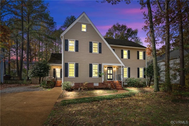 view of front of home with crawl space