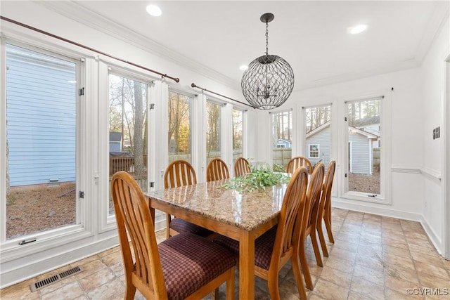 dining room with visible vents, baseboards, recessed lighting, crown molding, and a chandelier