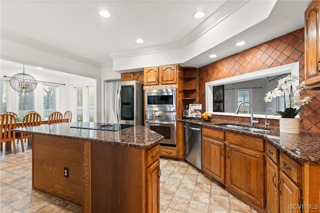 kitchen with a sink, open shelves, a center island, appliances with stainless steel finishes, and brown cabinetry