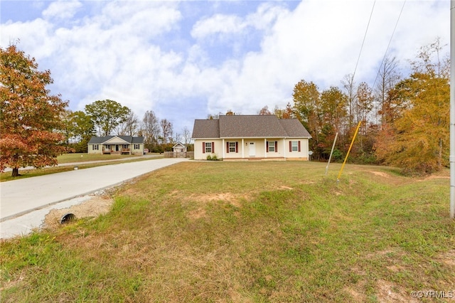 view of front of house featuring a porch and a front lawn