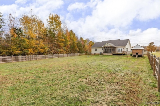 view of yard featuring a wooden deck