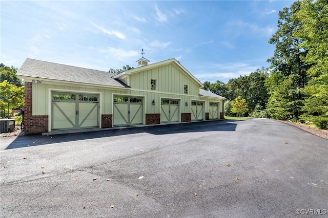 garage with central AC unit