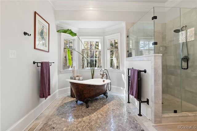 bathroom featuring separate shower and tub and crown molding