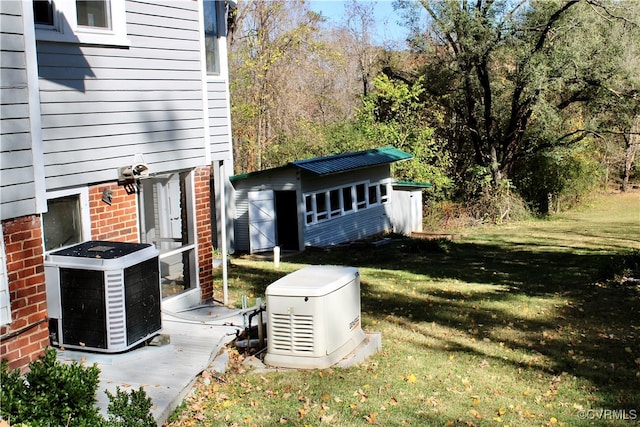 exterior space with a storage shed and central AC unit