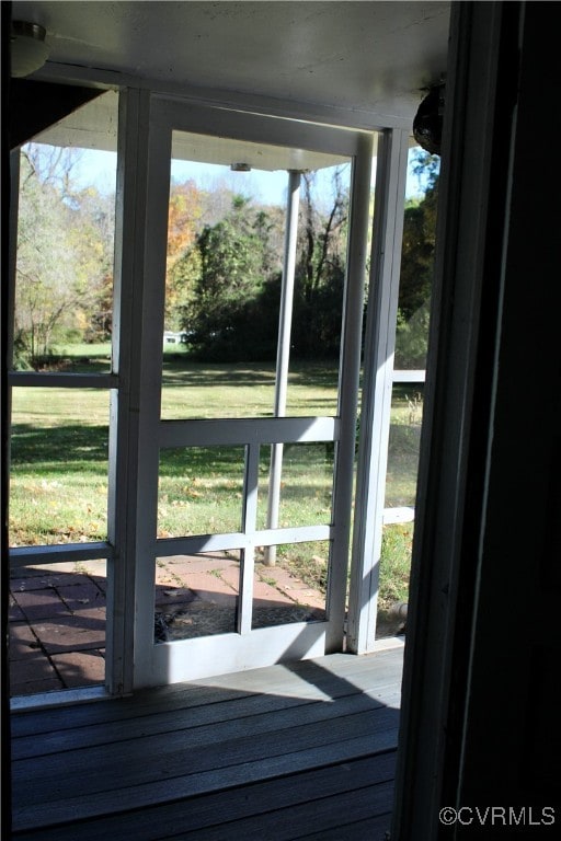 doorway to outside featuring a wealth of natural light