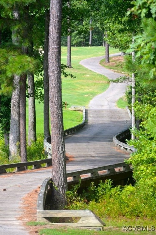 view of community featuring a lawn