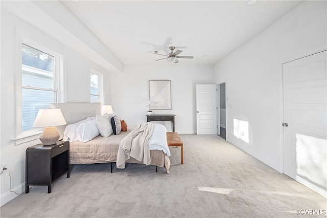 carpeted bedroom featuring ceiling fan