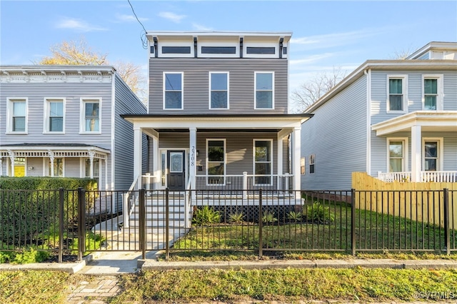 italianate-style house featuring covered porch