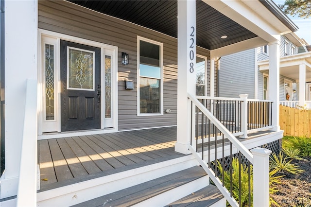 doorway to property with covered porch