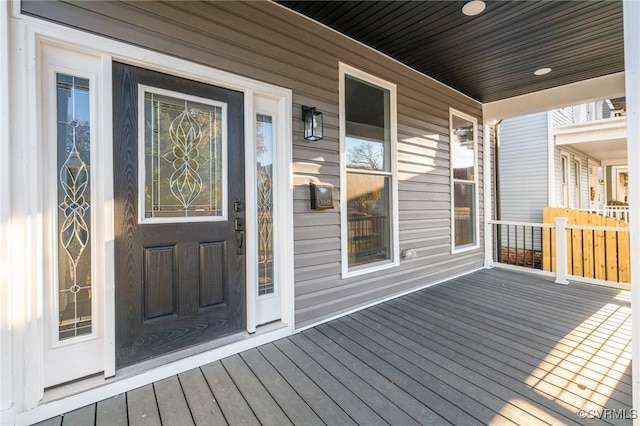 entrance to property with covered porch