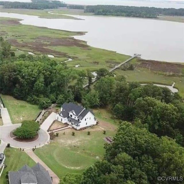 drone / aerial view with a water view and a rural view