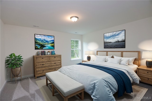 bedroom with light colored carpet