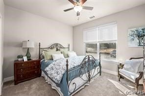 bedroom with carpet, multiple windows, and ceiling fan